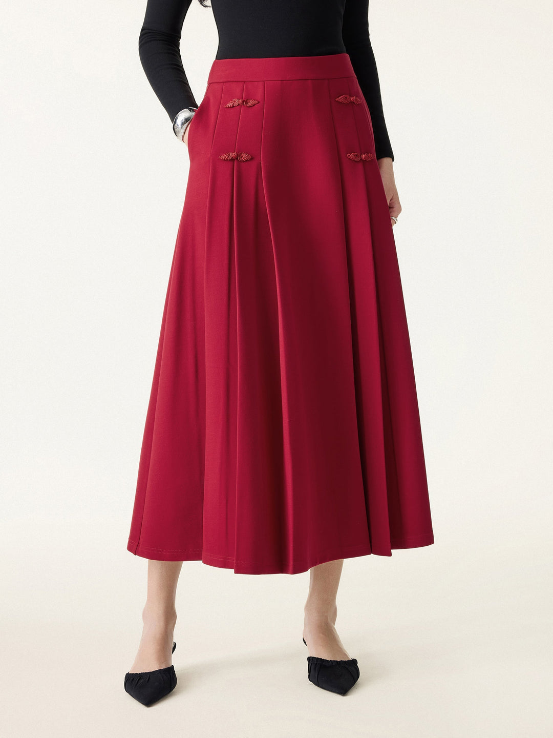 NORELLA | Pleated Midi A-Line Skirt with Frog Button Detail
