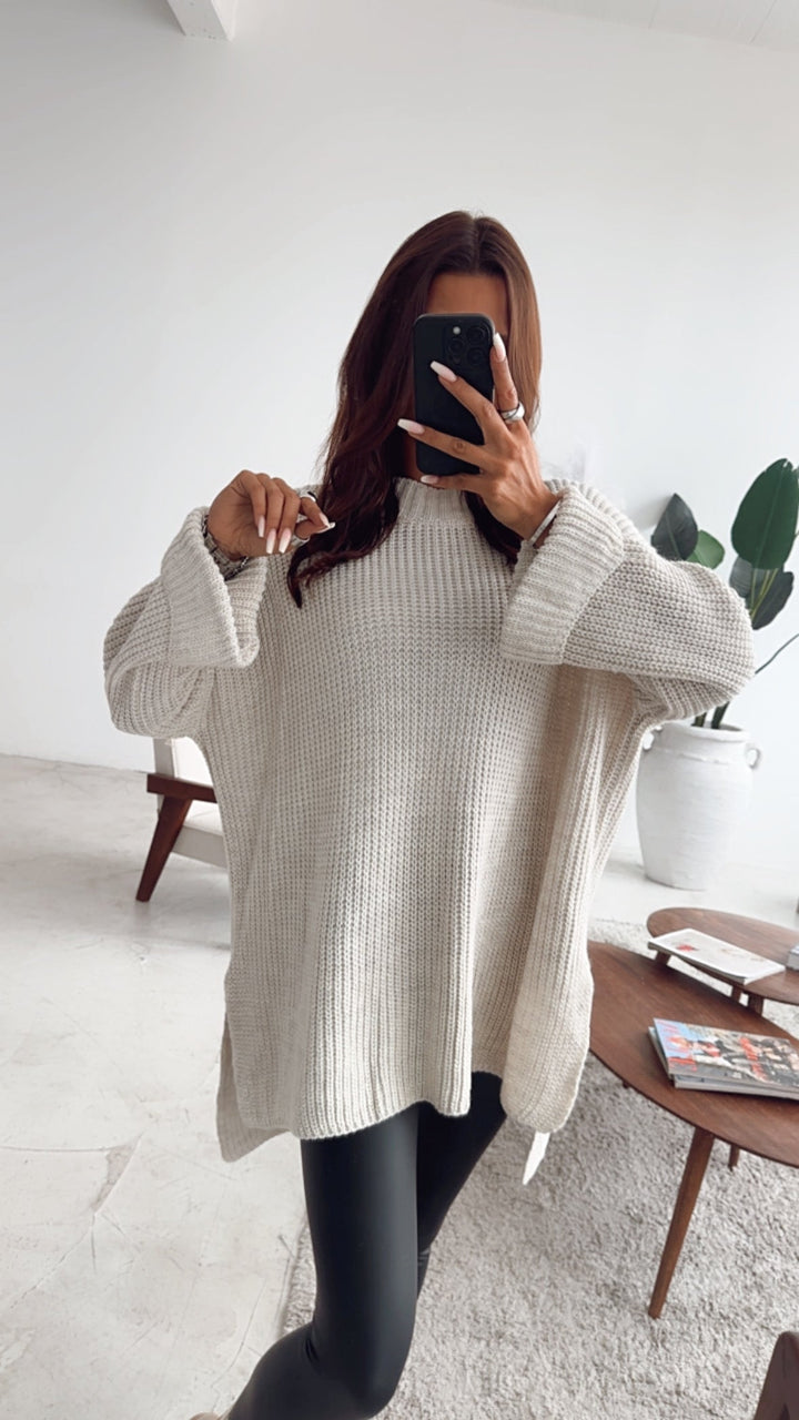 NORELLA | Oversized jumper with high collar and split / beige