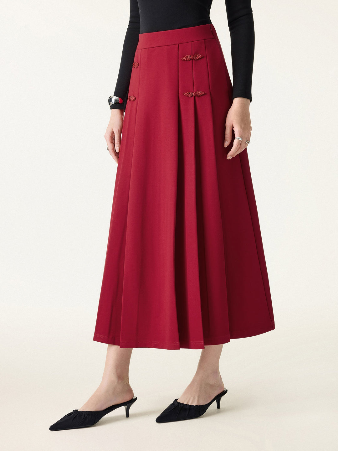 NORELLA | Pleated Midi A-Line Skirt with Frog Button Detail